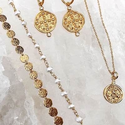 Nicole Fendel - Cross Of The Earth Necklace in Gold