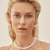 Nicole Fendel - Gia Huggie Earrings in Gold & Freshwater Pearl
